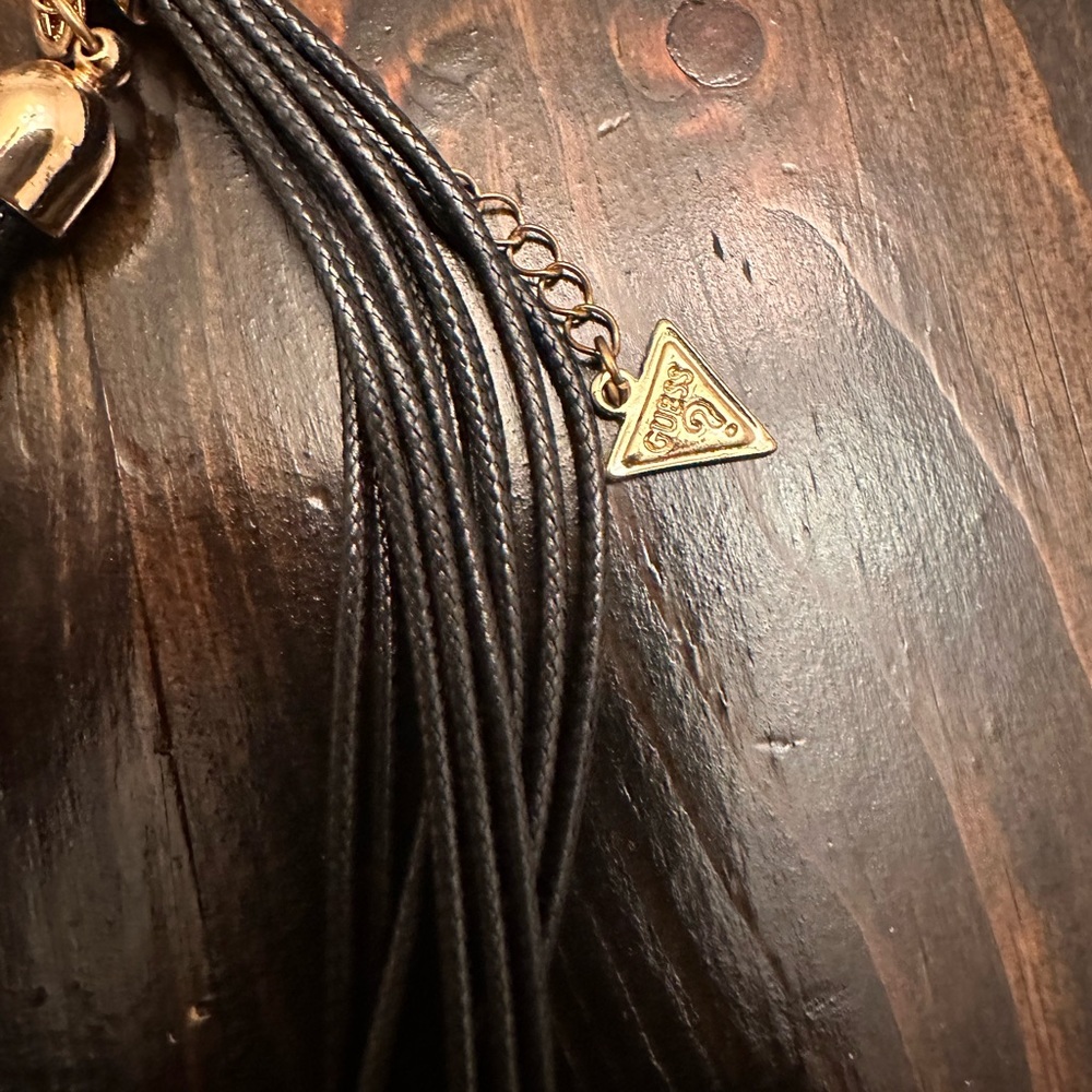 Guess black and gold necklace. Great condition.